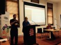 Barbara Carter presenting on Child Protection with an Interpreter, and Kate Fitt sitting in the background