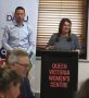 Jenny Bretnall at lectern with auslan interpreter